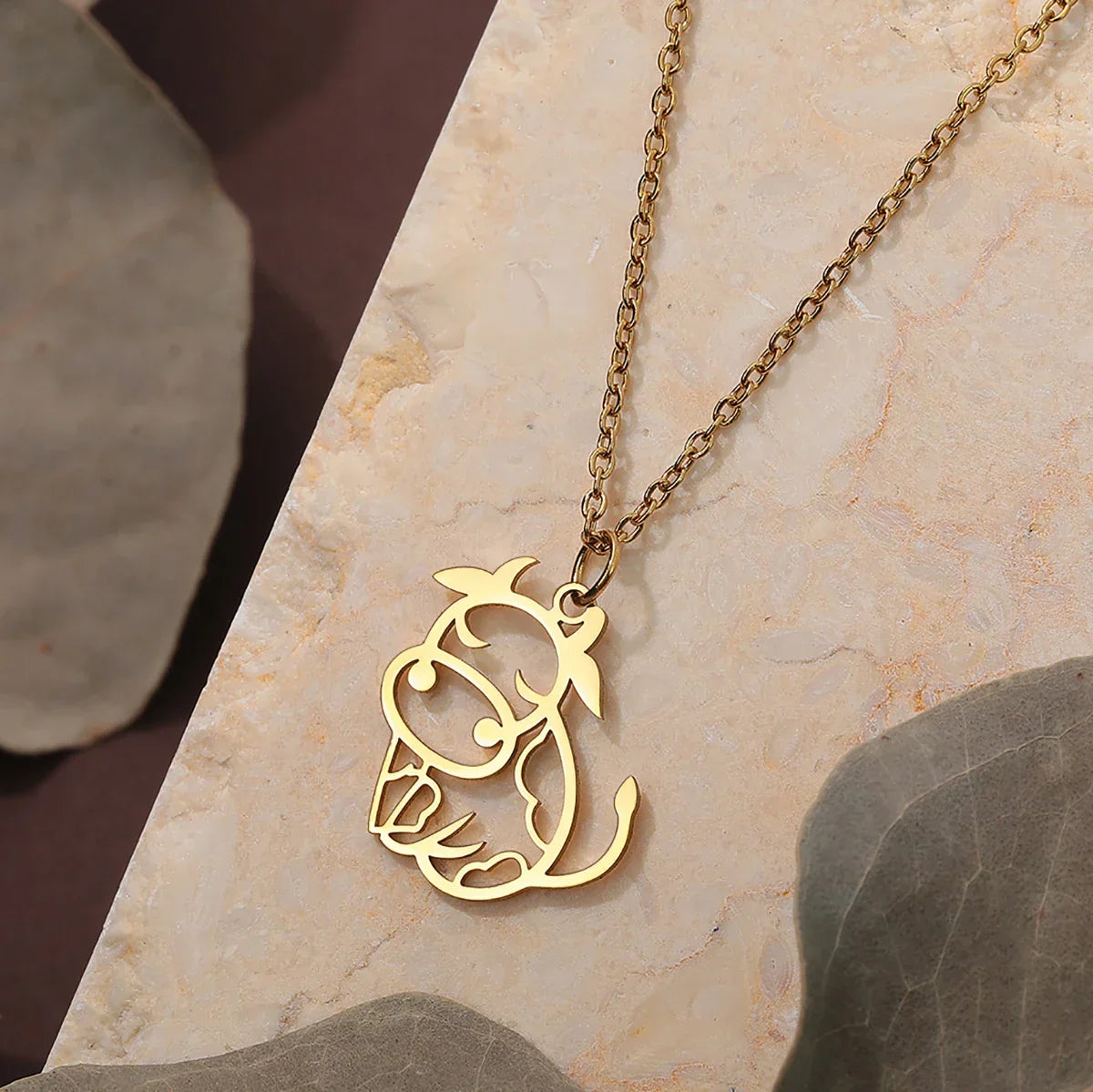 Conjunto Corrente e Pingente Vaquinha Vasada Dourada