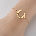 Pulseira Ferradura de Aço Dourada